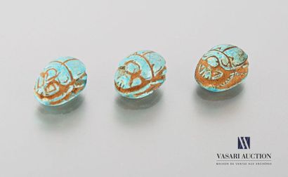 null EGYPT
Three turquoise Egyptian earthenware amulets representing beetles and...