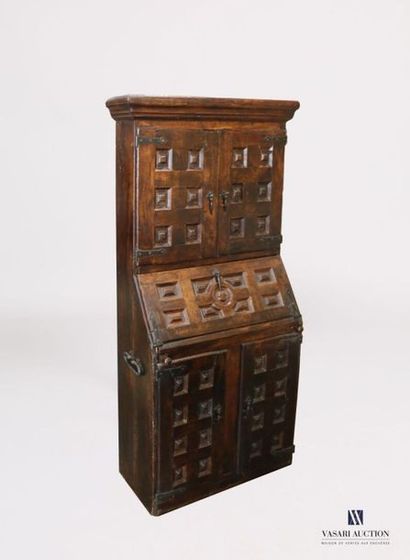null Moulded natural wood secretary with relief tile decoration, its upper part opens...