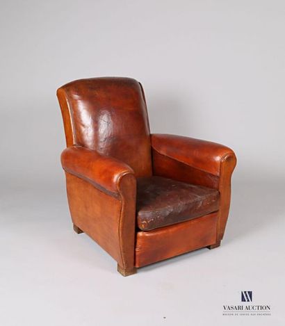 Brown leather club armchair, the backrest...