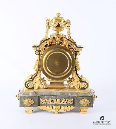 null An important ormolu clock with a round white enamelled dial with Roman numerals...