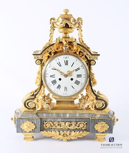 null An important ormolu clock with a round white enamelled dial with Roman numerals...