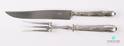 null A cutlery service cover, the silver handle filled with fillets framing a knot...