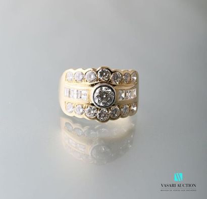 null 750 thousandths yellow gold band ring set with three rows of diamonds: two of...
