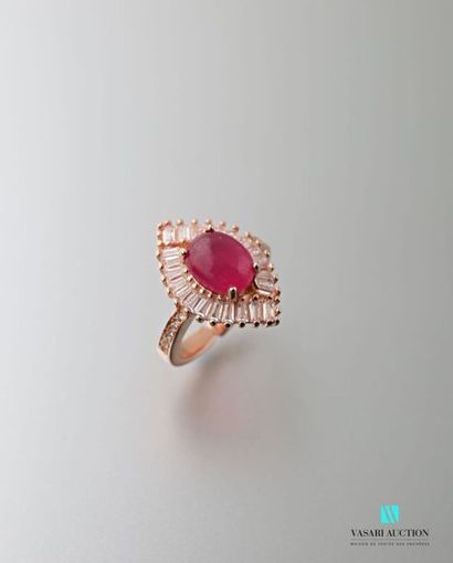 null Ring in pink vermeil 925 thousandths open, shuttle motif set with a cabochon...