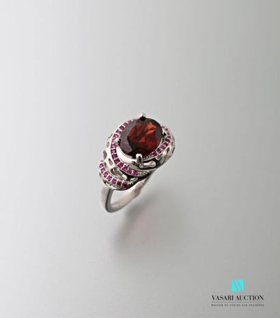 null 925 sterling silver ring set with an oval red garnet in a double surround of...