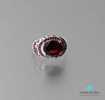 null 925 sterling silver ring set with an oval red garnet in a double surround of...