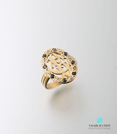 null Ring in 750 thousandths yellow gold, oval openwork pattern adorned with BC numerals...