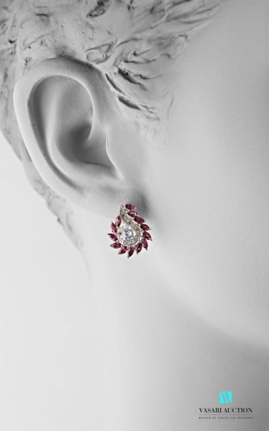 null Pair of drop shape earrings set with shuttle size garnets, yellow sapphires...