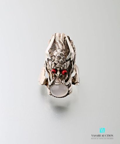 null Silver ring in the shape of a dragon's head, mouth decorated with an opalescent...