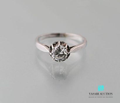 null Platinum ring 850 thousandths set with a half size solitaire diamond of about...