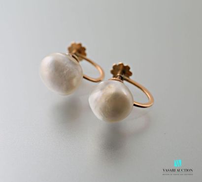 null Pair of 750 thousandths gold earrings set with two probably fine baroque pearls,...
