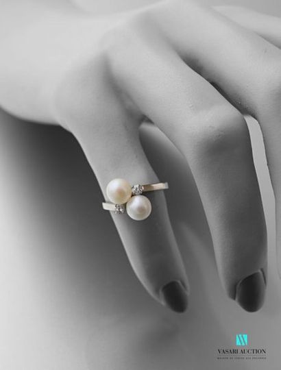 null Ring Toi et moi in 750 thousandths gold set with two cultured pearls and two...