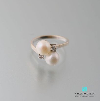 null Ring Toi et moi in 750 thousandths gold set with two cultured pearls and two...