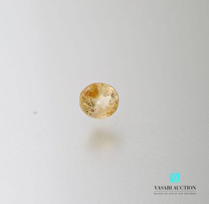 null Oval yellow sapphire on 2.05 carat paper with its GFCO certificate of 13 August...