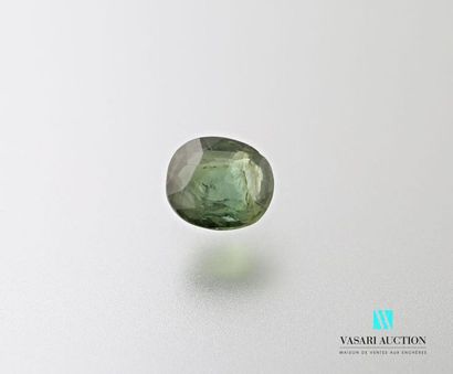 null Oval green sapphire on 2.92 carat paper. Two shocks with lack of material.
