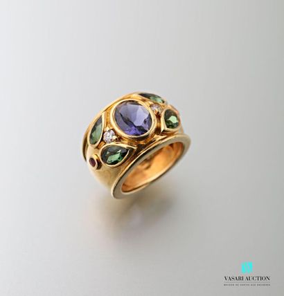 null Cartier, large rush ring set with an oval iolite in the centre, with two pear-shaped...