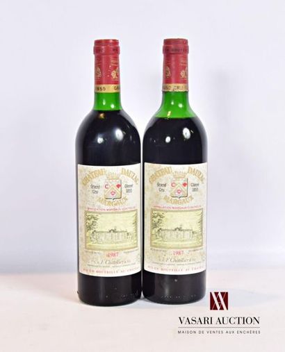 null 2 bottlesChâteau DAUZACMargaux GCC1987
And. a little faded and stained. N :...
