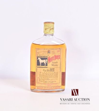 null 1 flaskScotch Whisky WHIRTE HORSE
37.5 cl - 43°. And. a little faded and stained...