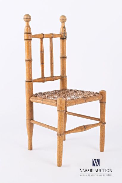 null STERN FURNITURE

Wooden doll's chair with a cane seat and legs joined by three...