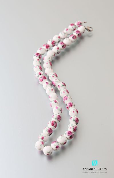null Necklace made of ceramic beads decorated with flowers, the clasp snap hook in...