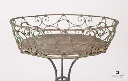 null Wrought iron planter, the round basin is hemmed with an openwork gallery, it...
