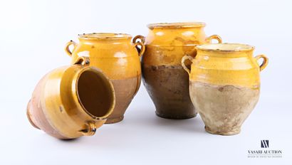 null Set of four ovoid earthenware jars with handles, the upper third of the handles...