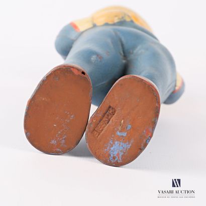 null Polychrome plastic toy representing a young sailor with a pipe 

Hungarian Labour

(wears)

High....