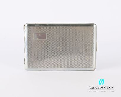 null Rectangular metal cigarette case decorated with a blind cartouche on a guilloche...