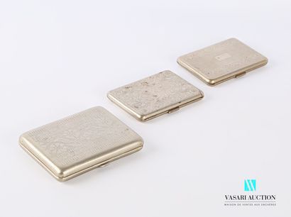 null Set of three hinged cigarette cases comprising :

Rectangular-shaped metal cigarette...