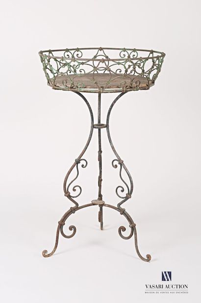 null Wrought iron planter, the round basin is hemmed with an openwork gallery, it...