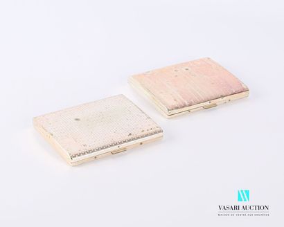 null Set of two hinged cigarette cases comprising : 

-Slightly curved cigarette...