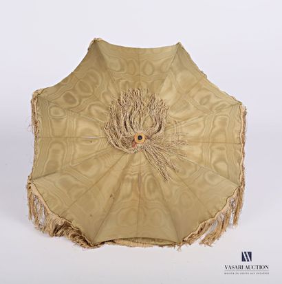 null Umbrella in aniseed green silk, lined in cream silk, the handle is partly made...