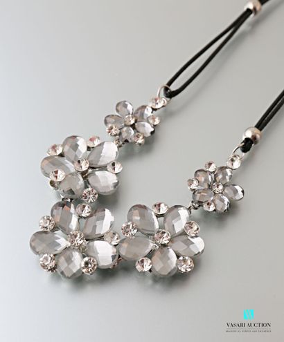 null Necklace adorned with five floral motifs embellished with rhinestones on leather...