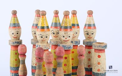 null Painted wooden bowling alley with clowns 

Five painted and turned wooden skittles...