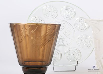null Smoked glass vase with cut-off sides, the body with engraved decoration of stylized...