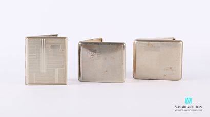 null Set of three hinged cigarette cases comprising : 

-Metal cigarette case decorated...