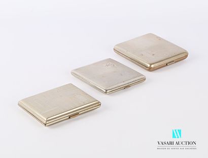 null Set of three hinged cigarette cases comprising : 

-Metal cigarette case decorated...