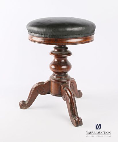 null Piano stool in mahogany, adjustable seat, the baluster shaft finished with four...