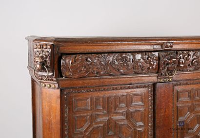 null Moulded and carved oak sideboard with a drawer with a central lion's head decoration...