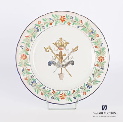 null Earthenware plate, the basin with polychrome decoration of a fleur-de-lys topped...
