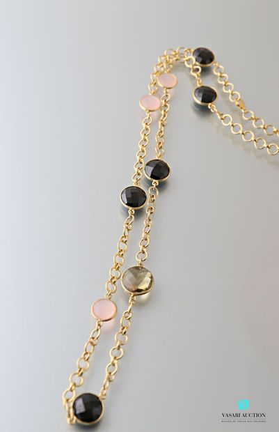 null Vermeil necklace decorated with faceted onyx and rose quartz pellets.

Length...