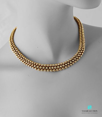 null Butcher's necklace circa 1980, set in 750 thousandths yellow gold decorated...