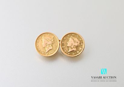 null Cufflink made of two 1-dollar coins linked by a 750 thousandths yellow gold...