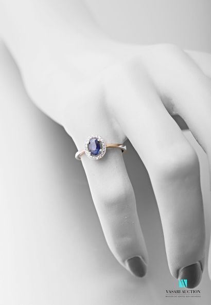 null 925 sterling silver ring set with an oval sapphire surrounded by white stones

Weight:...