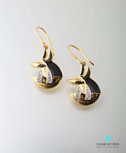 null Pair of gilt silver earrings featuring Anubis heads decorated with onyx and...