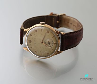 null Moeris, 1950s men's wristwatch, round case in 750 thousandths yellow gold, cream...
