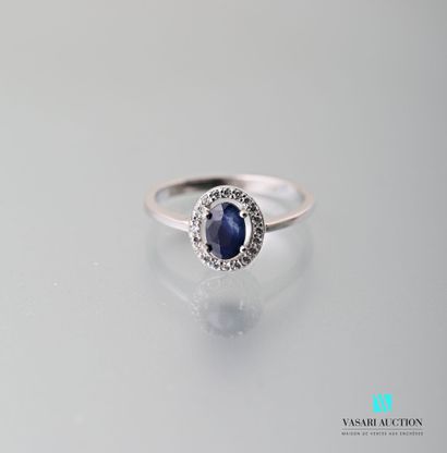 null 925 sterling silver ring set with an oval sapphire surrounded by white stones

Weight:...