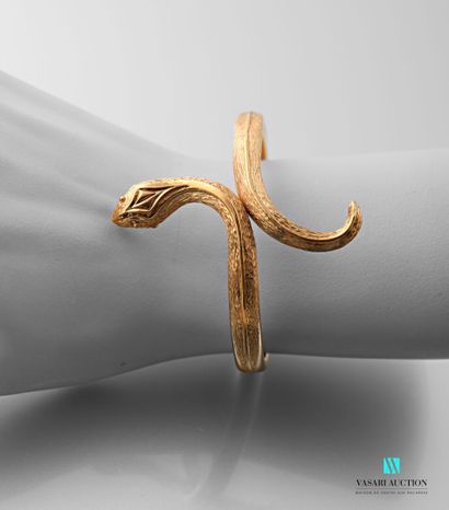 null Open snake bracelet in smooth and guilloché 750 yellow gold

Gross weight :...