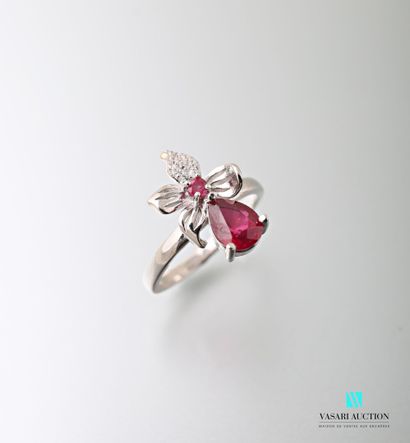 null 925 sterling silver ring set with a treated pear cut ruby surmounted by a floral...