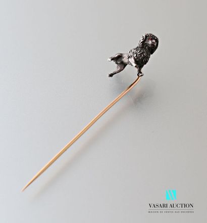null Pin, the stem in rose gold 750 thousandths, with a dog motif in silver 925 thousandths,...